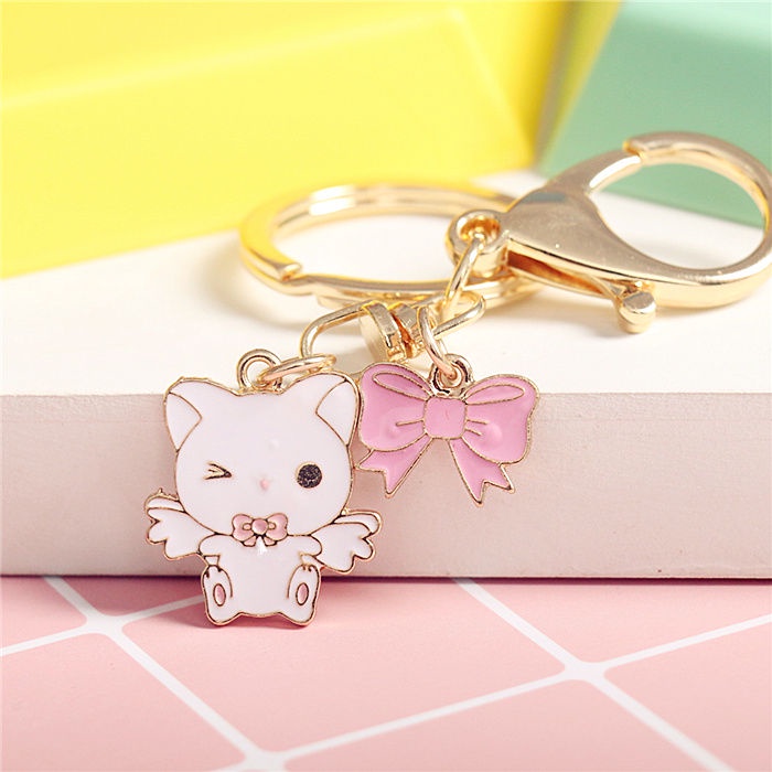 Móc Khóa Hình Thỏ / Mèo / Ngựa Thắt Nơ Dễ Thương Sáng Tạo