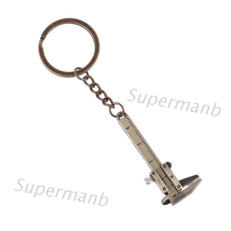 Móc khóa hình dạng thước cặp mini tiện lợi