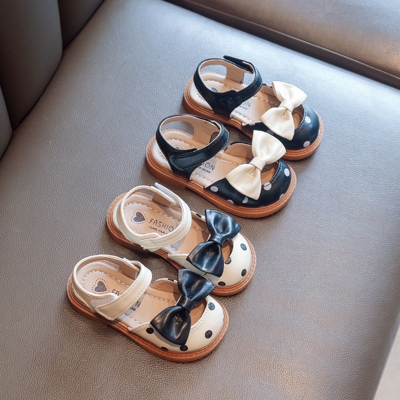 Giày búp bê bé gái, Giày sandal bé gái chấm bi quai dán phối nơ chất da PU mềm chống trơn trượt tốt  M13