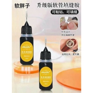Bút nhả gel đính đá tem vàng Huaxi/ Vins