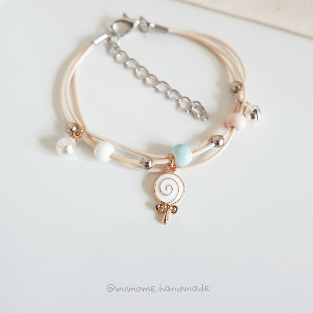 Vòng gốm phối charm màu móc kim loại