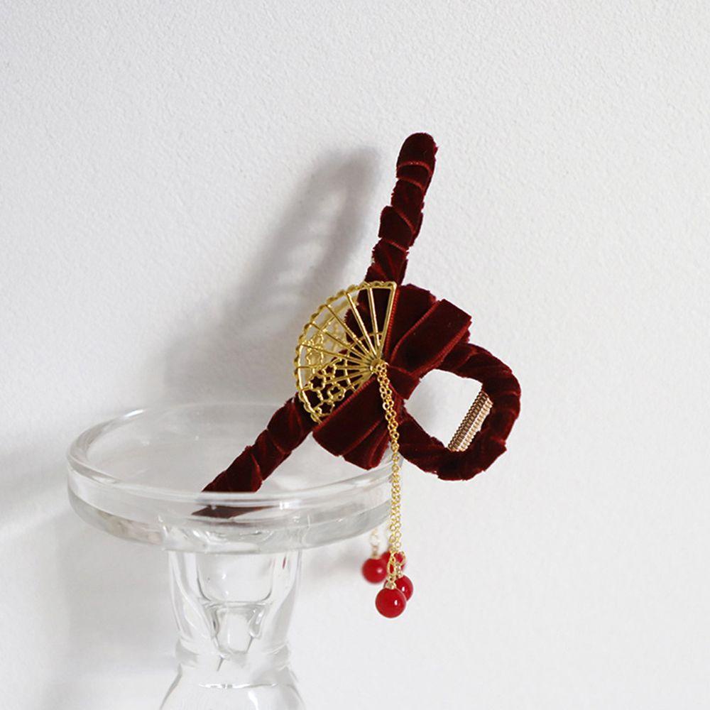 Kẹp Tóc Tua Rua Hình Bướm