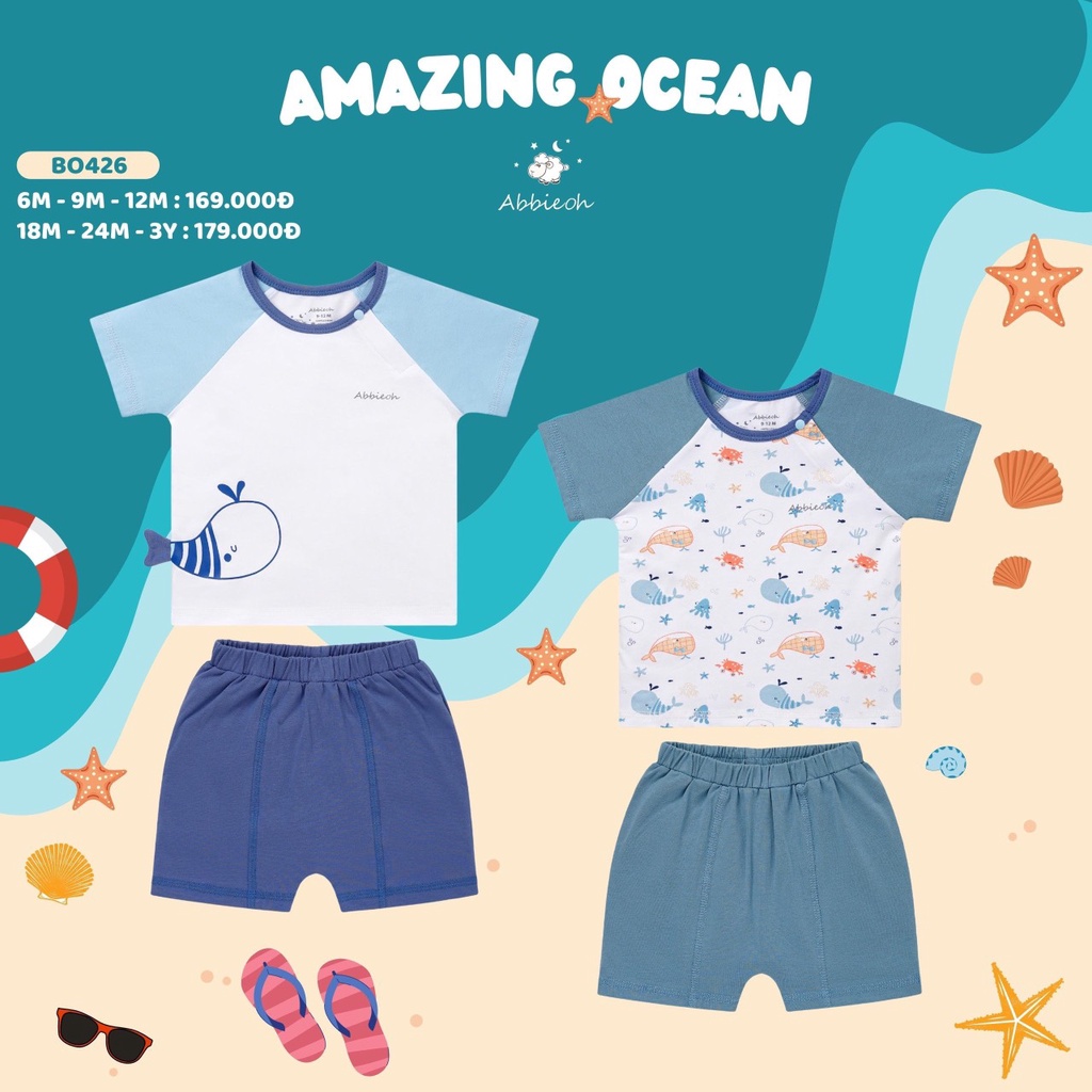Bộ cộc tay raglan cài vai quần đùi họa tiết cá heo trẻ em Abbie Oh