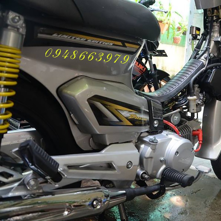 GÁC CHÂN DREAM 125 CHÍNH HÃNG.