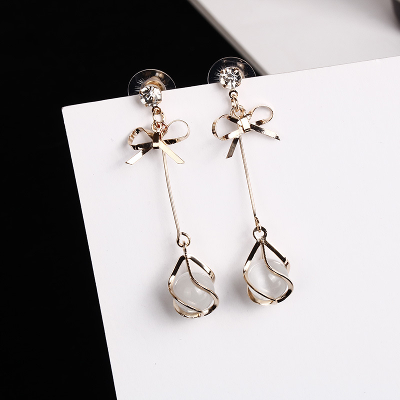 Đôi bông tai mạ bạc 925 hình nơ tua rua dài