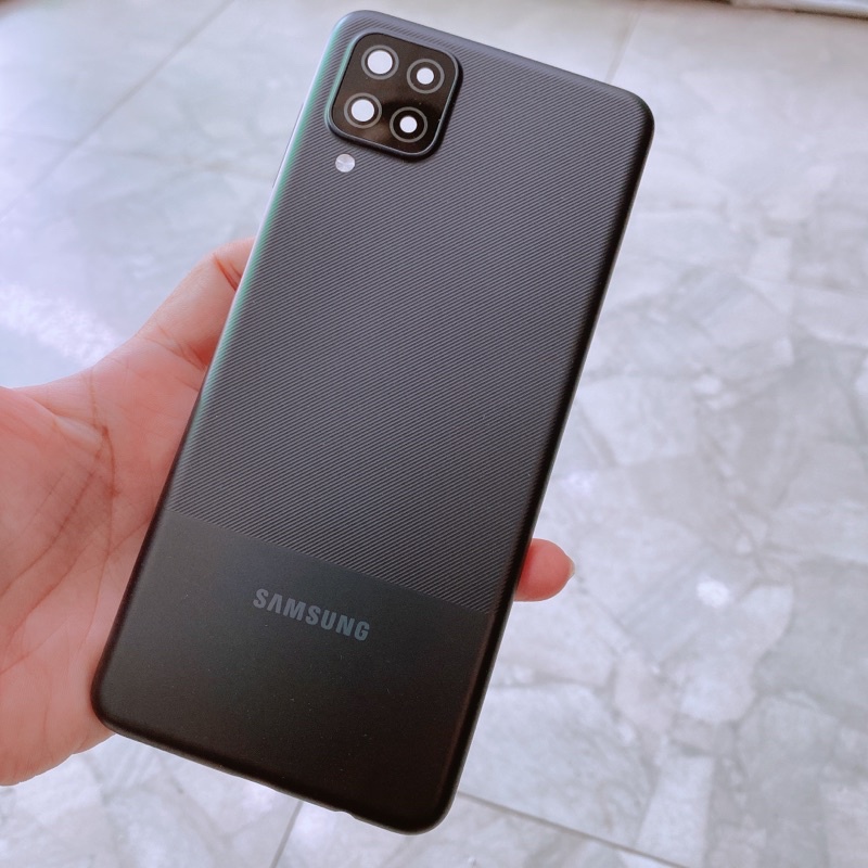 Nắp lưng Samsung A12 kèm cụm kính camera và nút bấm volume , keo dán t8000