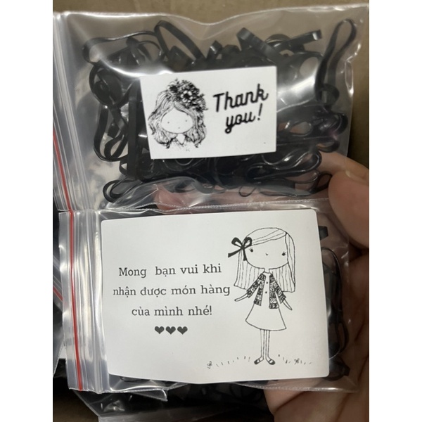 Thun cột tóc màu đen hoặc màu