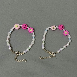Vòng tay mặt cười hồng
