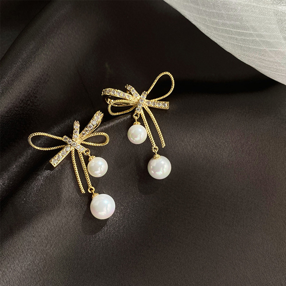 Đôi Khuyên Tai Hình Nơ Đính Ngọc Trai Xinh Xắn