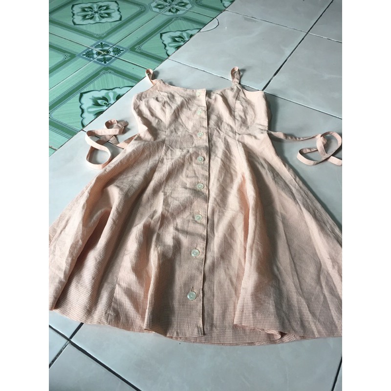 Đầm caro nhí nút