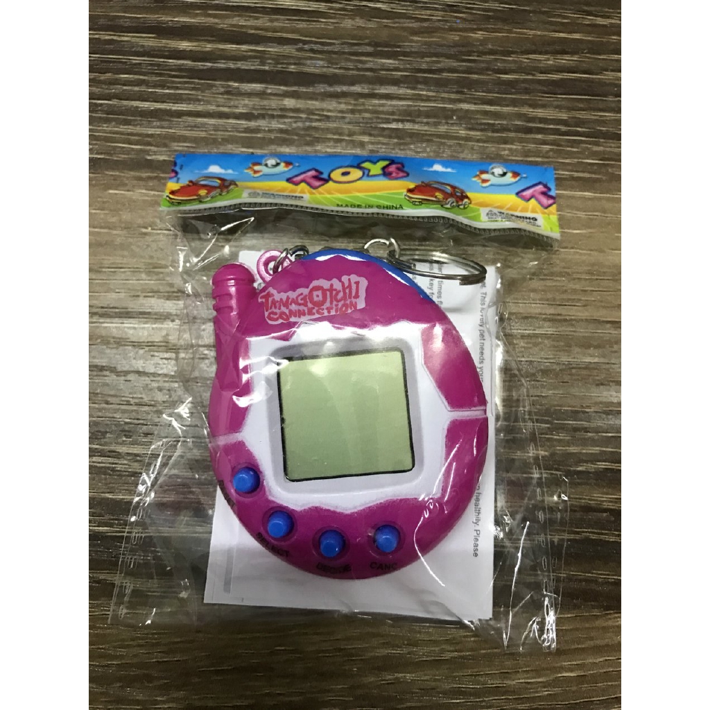 Máy Nuôi Thú Ảo Tamagotchi Màu Sắc Ngẫu Nhiên