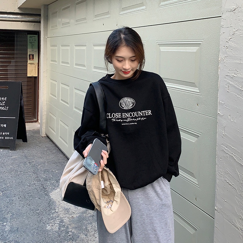 Áo thun tay dài dáng rộng in chữ phong cách Hàn Quốc thời trang cho nữ