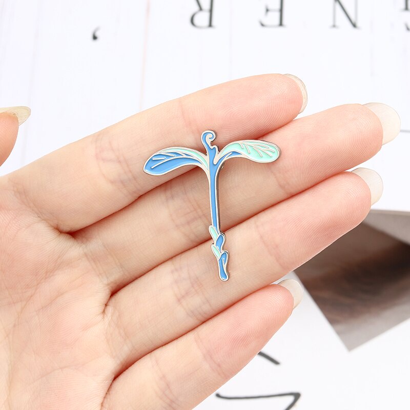 Pin cái áo chồi cây dạ quang trong tối - GC489