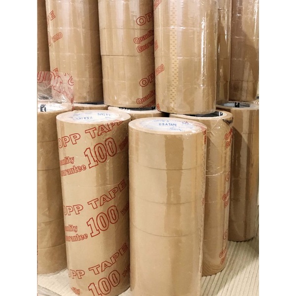 Băng keo đục 100y ( 1 cuộn) siêu dính để dán thùng giấy carton đóng hàng giá rẻ tận xưởng giao hỏa tốc nhận hàng ngay