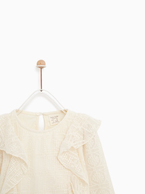 Áo sơ mi riềm bèo màu be