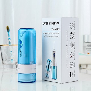 MÁY TĂM NƯỚC ORAL IRRIGATOR IPX7, TẶNG TÚI ĐỰNG + BẢO HÀNH 6 THÁNG chính hãng( Màu Xanh)