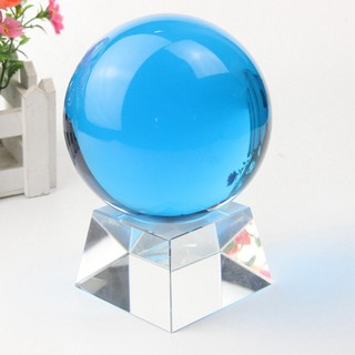 Blue crystal ball with transparent base