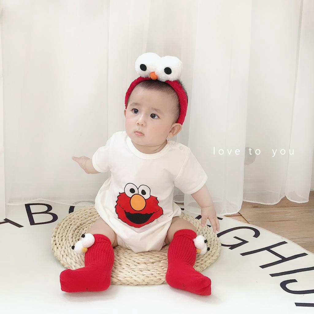 Bộ áo liền quần kèm mũ vải cho bé họa tiết hoạt hình