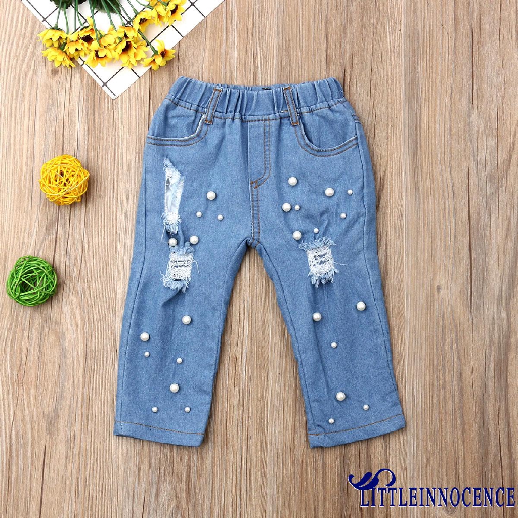 Quần jeans xẻ rách cá tính cho bé gái