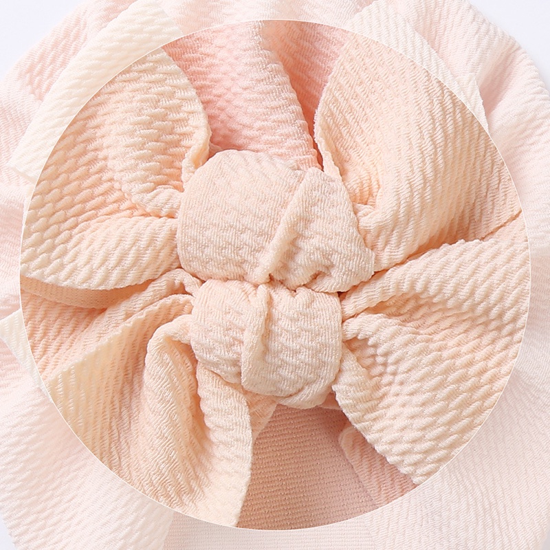 Mũ beanie thắt nơ dễ thương cho bé