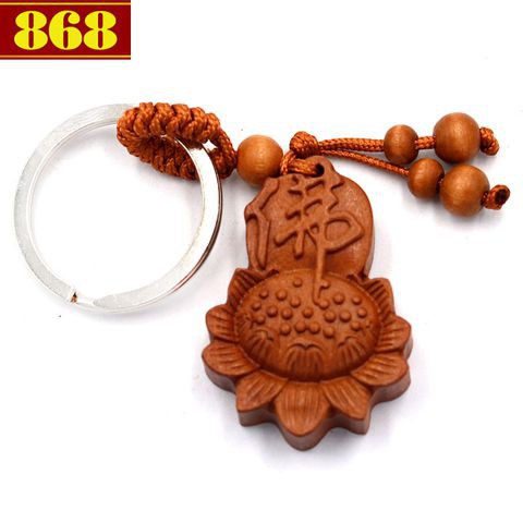 Móc khóa gỗ khắc hoa sen và chữ Phật