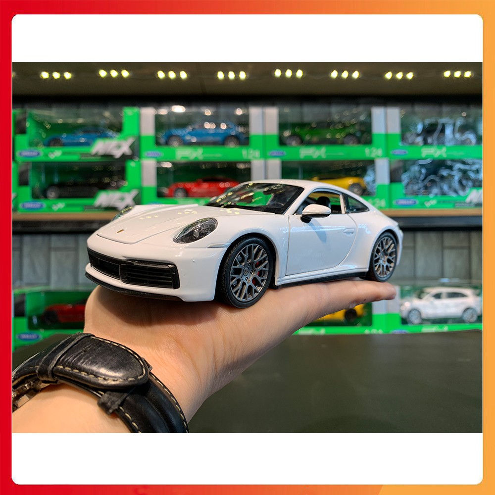 Mô hình xe Porsche 911 Carrera 4S tỉ lệ 1:24 hãng Welly[Fullbox]