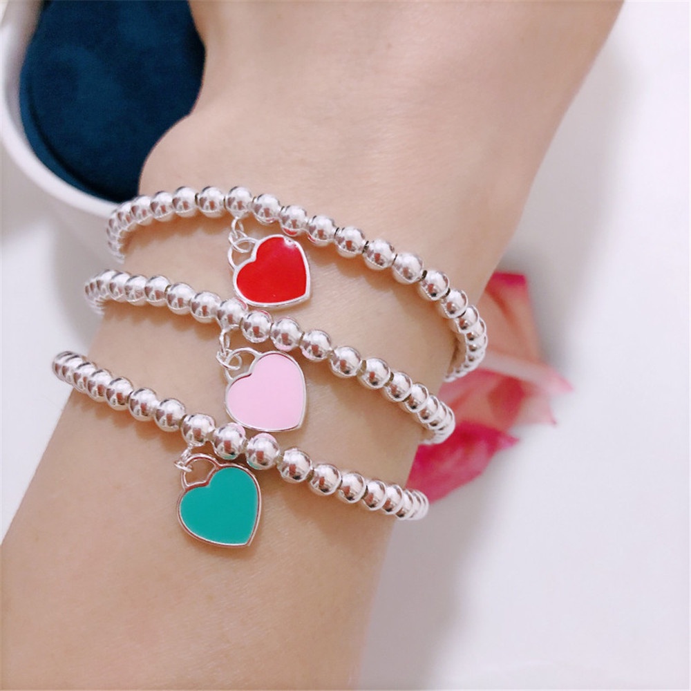 1 vòng tay chuỗi hạt hình trái tim ba màu sắc thời trang cho nữ