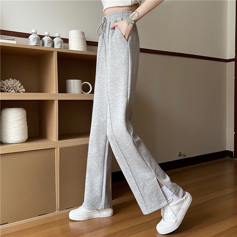 Quần dài dáng rộng lưng cao với thiết kế xẻ tà phối dây rút thời trang cá tính