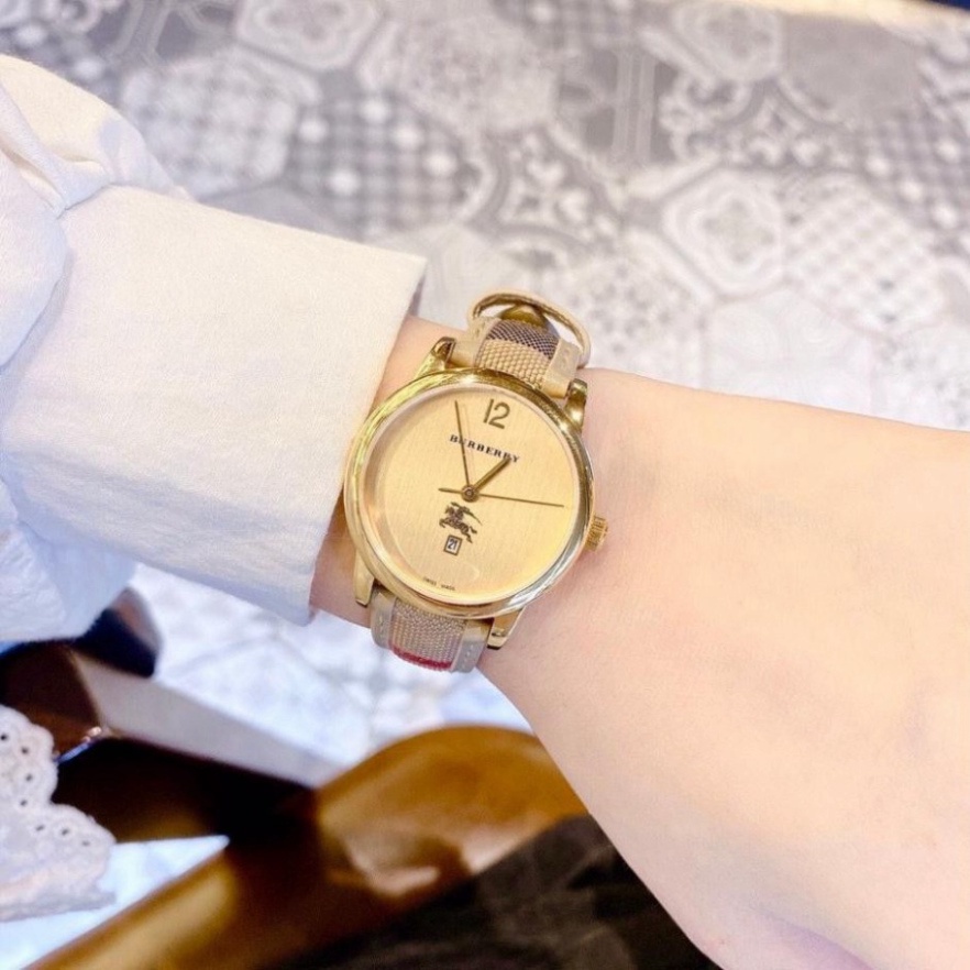 Đồng hồ nữ Burberry dây da cao cáp, kẻ caro tính tế, thẻ bảo hành 12 tháng - dong