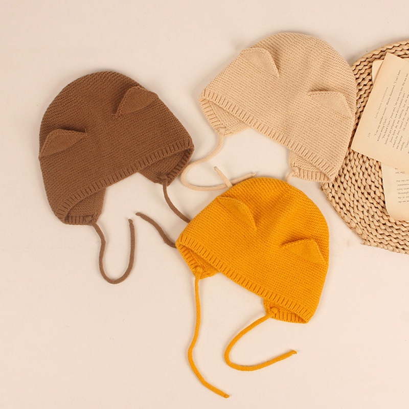 Mũ beanie trùm tai giữ ấm màu trơn thời trang thu đông phong cách dễ thương cho bé