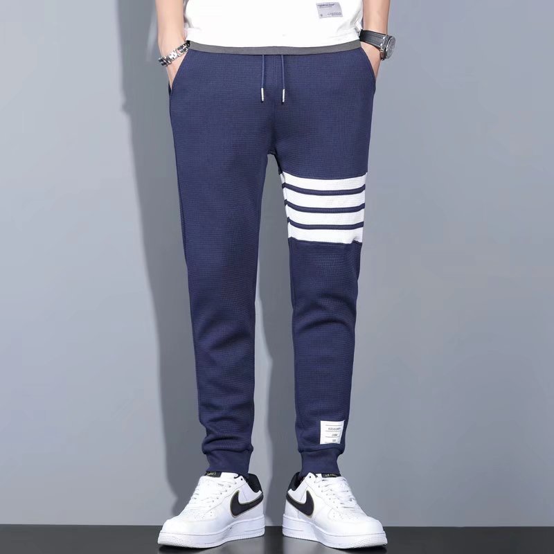Quần thể thao nam nữ chất vải tổ ong co giãn thoải mái, quần nam nữ thu đông dài Jogger Thom, mã Qjt Menzy