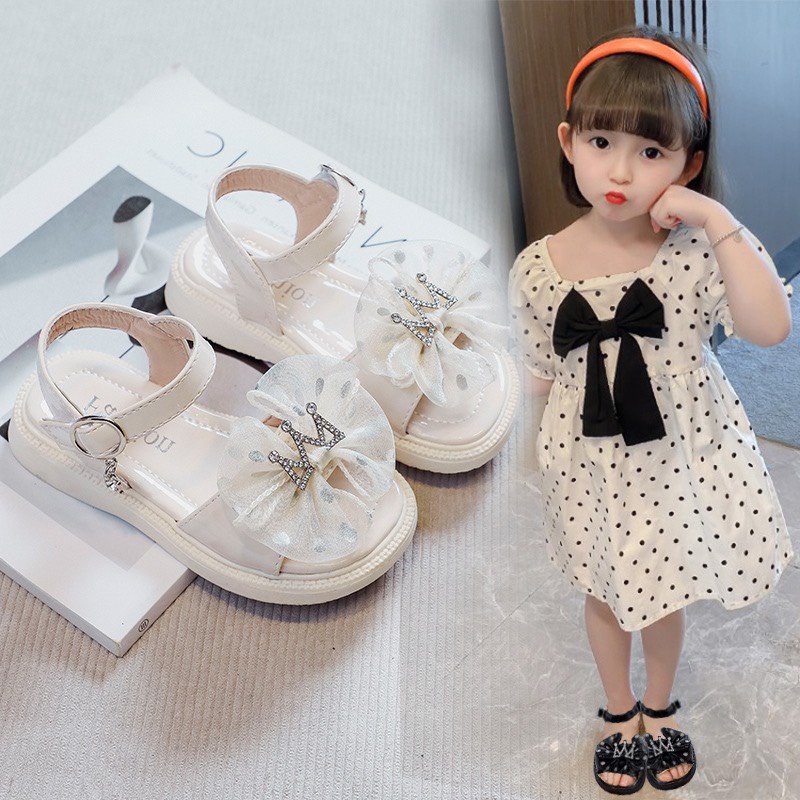 Sandal đính nơ kèm vương miện cho bé gái mẫu hot 2022 - Hàng Quảng Châu Cao Cấp (K63)