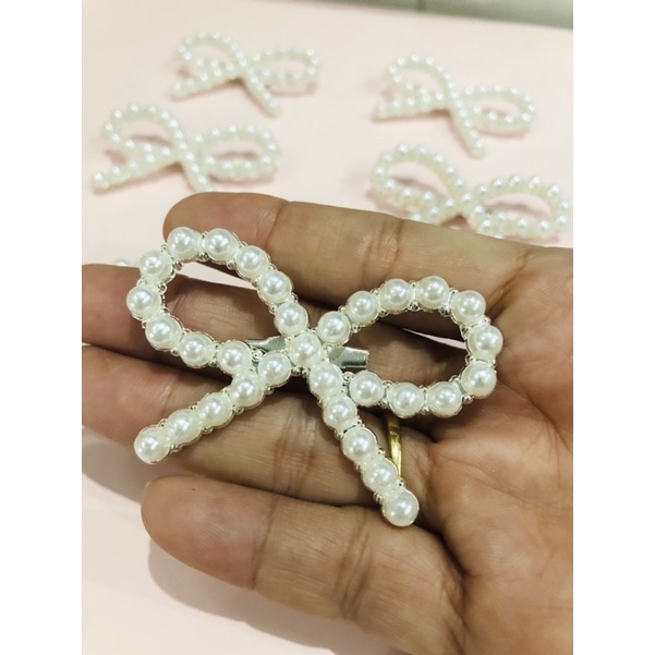 Cài áo nơ đinh hạt. KT 6 x 4cm