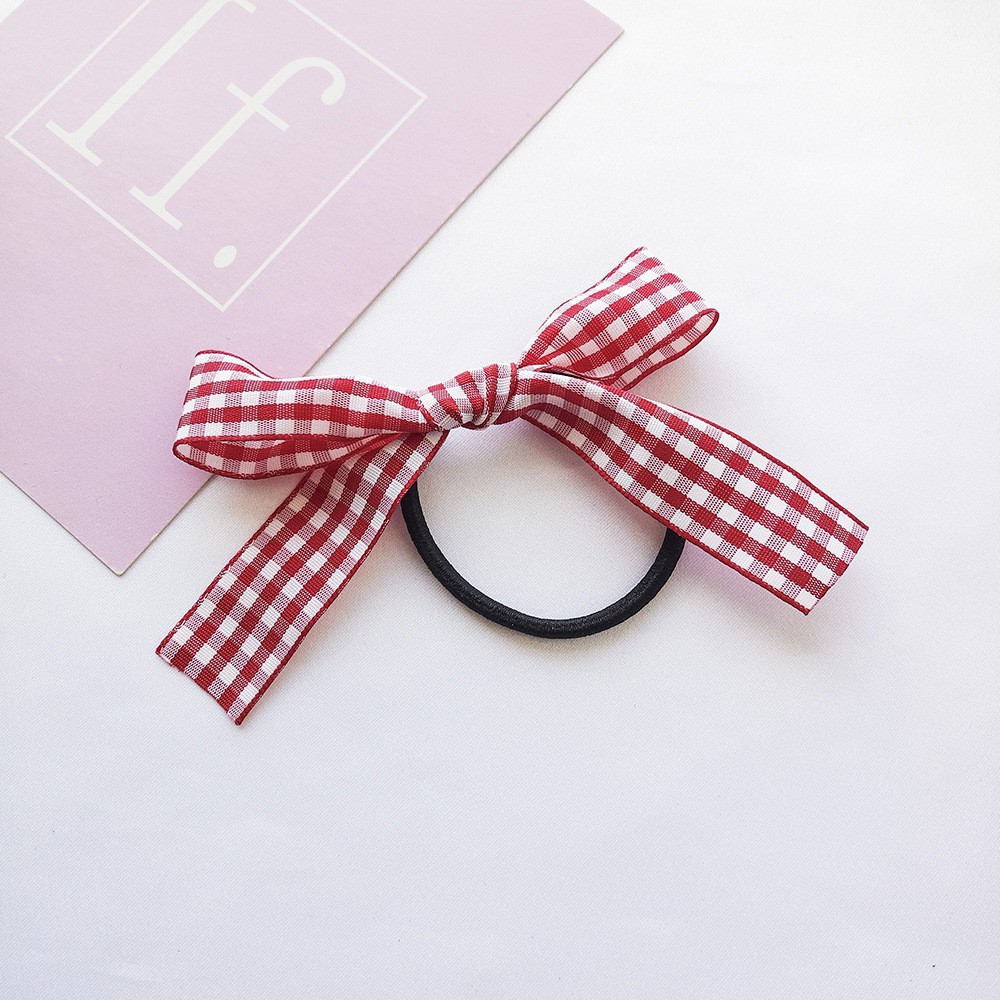 Thun cột tóc phối nơ B549 đính ngọc trai phong cách thời trang dễ thương