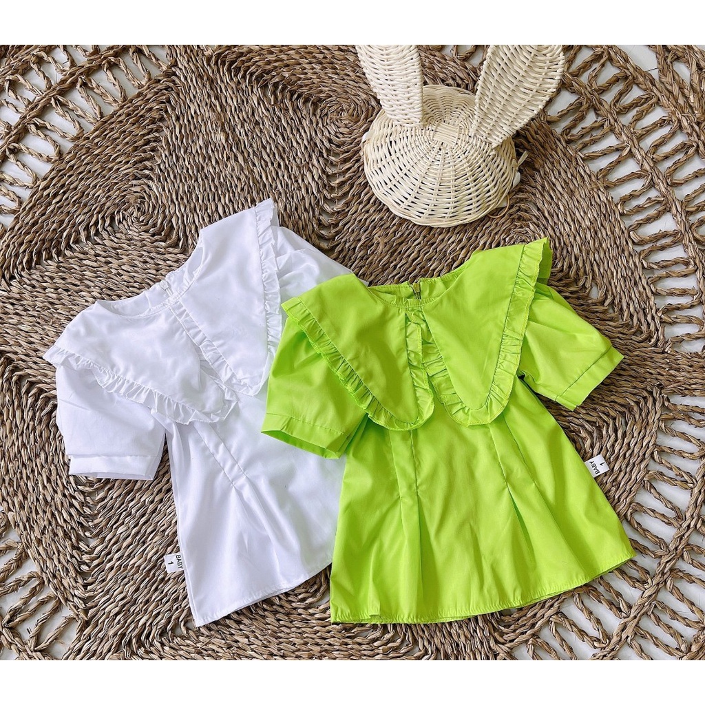 Váy thô nến viền bèo bé gái