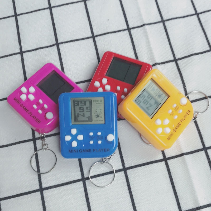 Máy chơi game mini trong suốt có màn hình LCD