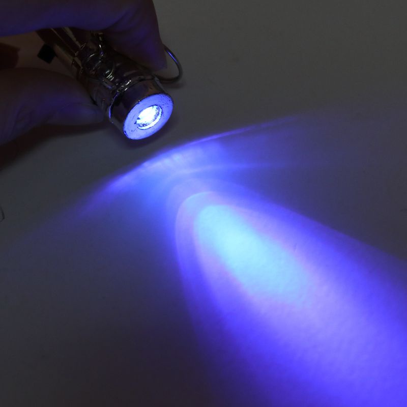 Móc khóa có đèn pin LED mini 2 trong 1 ánh sáng trắng/ tím tiện dụng