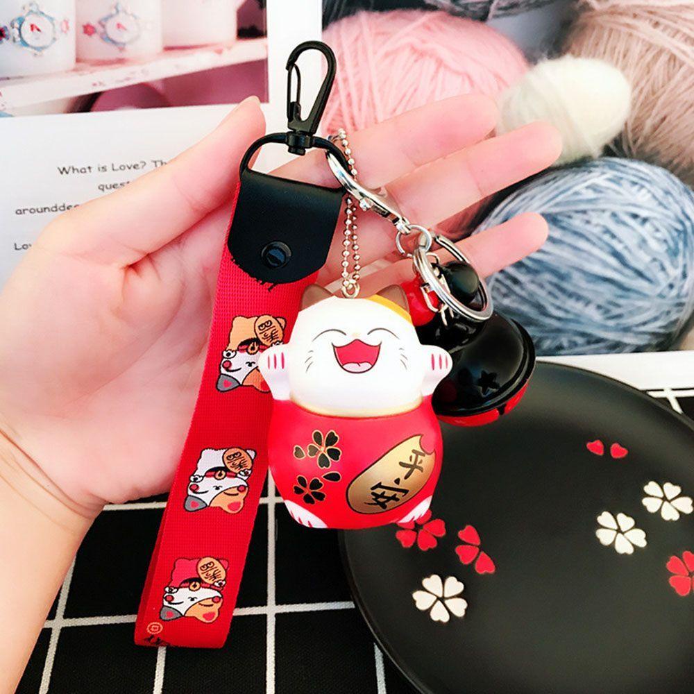 1 Móc Khóa Hình Mèo May Mắn Kèm Chuông Giá Đỡ Túi Xách