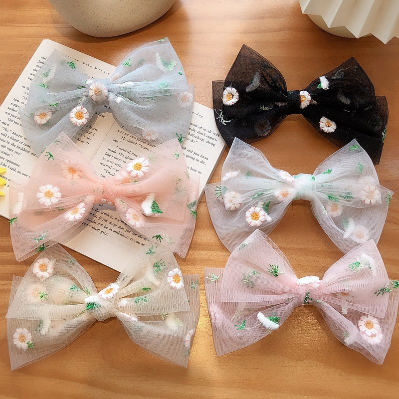 K70 Kẹp nơ hoa cúc lá xanh vải lưới