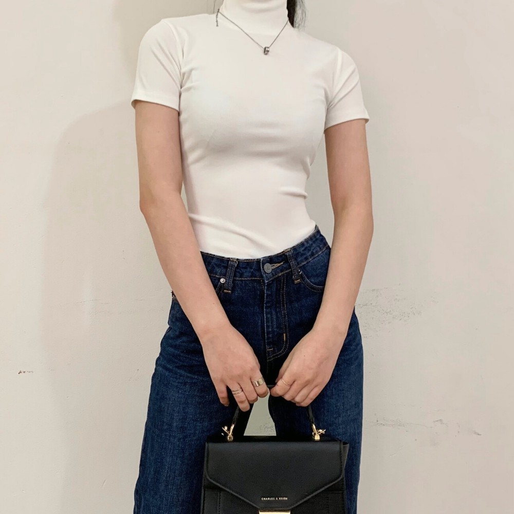 Áo cộc tay cổ lọ, ôm eo cực tôn dáng. Vải cotton sợi tăm loại 1, co dãn 4 chiều. Made by VIE fashion
