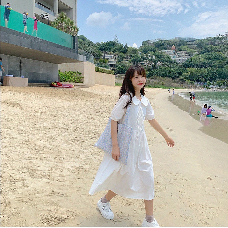 Váy đầm babydoll trắng tay phồng dáng dài babydoll đầm phong cách dễ thương thắt nơ vải thô mát mùa hè