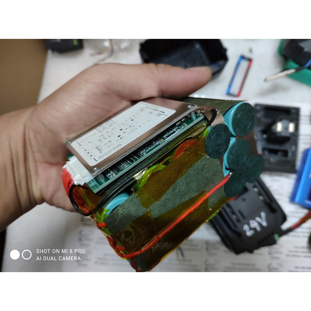 Bộ đế chuyển pin và pin khoan bê tông National 24V 7s2p 4Ah/bộ sang pin Makita cài LXT