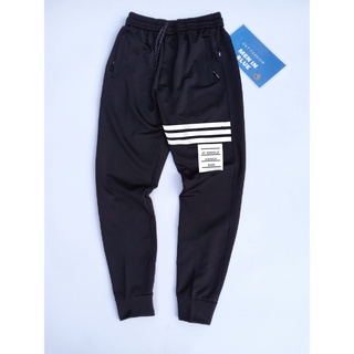 Quần dài nam thể thao jogger vải umi cao cấp dày đẹp,bo gấu,có túi khóa delala1991