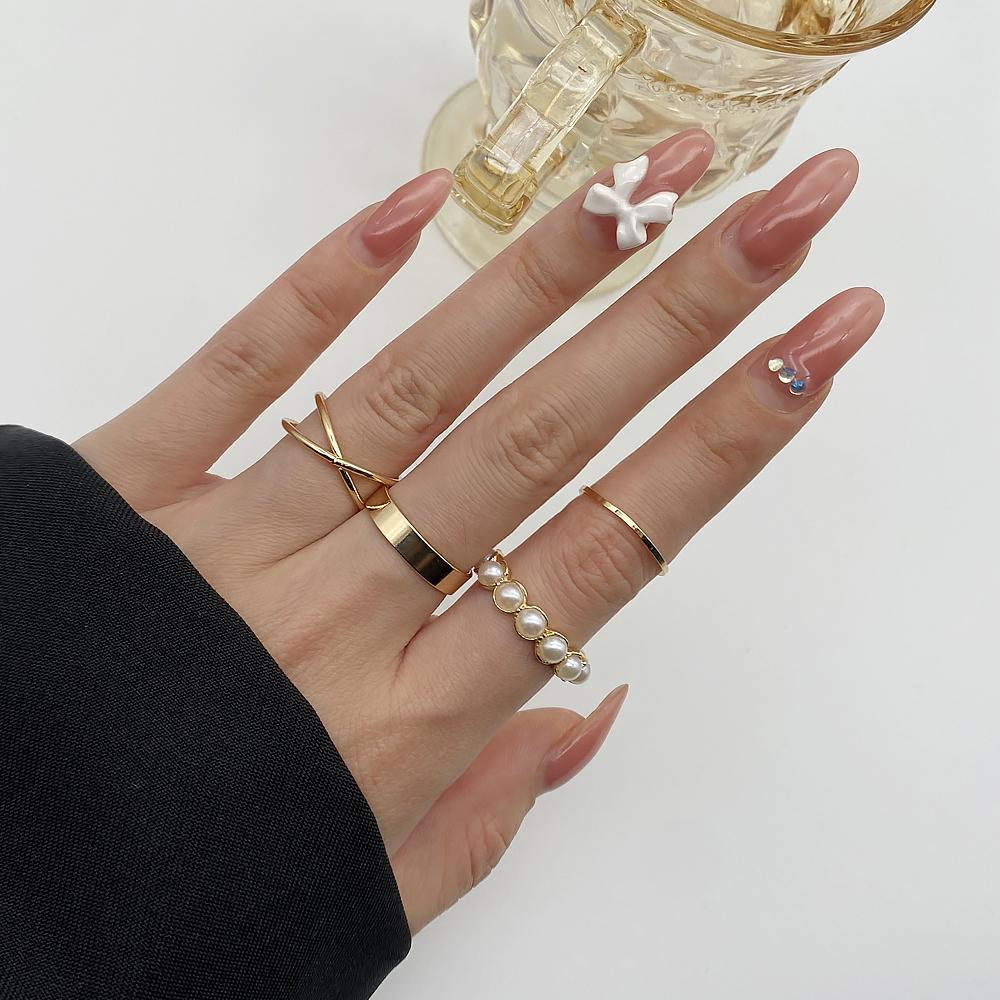 Set 4 Nhẫn Đeo Tay Kim Loại Thời Trang Cho Nữ