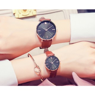 Đồng hồ nam nữ Kezzi 1829 mặt tròn dây da hàng chính hãng
