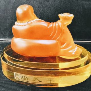 Di Lặc lưu ly để xe