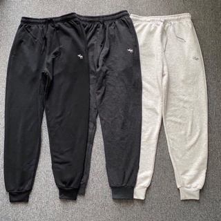 Quần jogger thêu nai ống bo