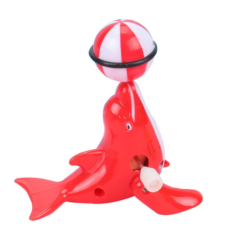 Đồ chơi vặn cót hải cẩu xoay bóng vặn cót 6.7*6.5cm DUASHOP.