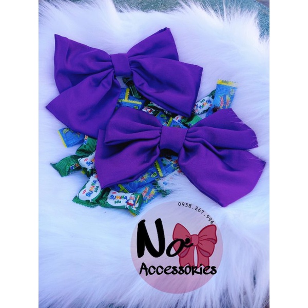 Cột, kẹp nơ màu tím