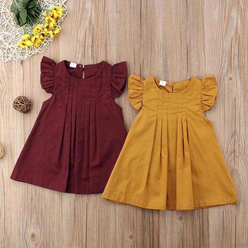 Đầm cotton màu trơn , tay bèo nhún cho bé gái
